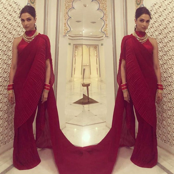 deepika red wedding dress From Deepika Padukone's ravishing red lehenga to Alia Bhatt's gilded ivory sari, take your pick from the most trending bridal colours. Get inspired by Bollywood's top wedding looks to create your own