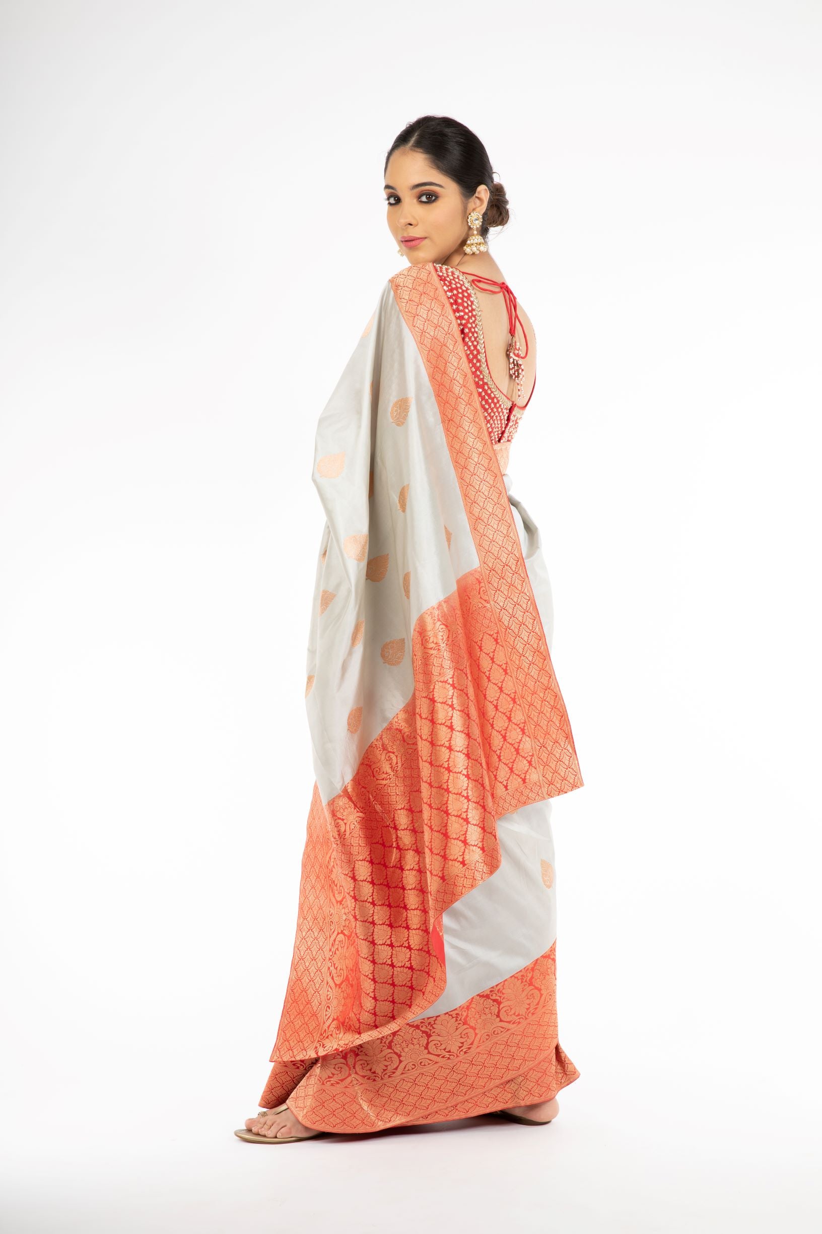 Adorning Grey Handloom Banarasi Silk Saree with Red Color Pallu