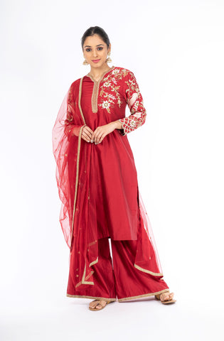 Alluring Deep Red Chanderi Silk Salwar Kameez with Net Dupatta