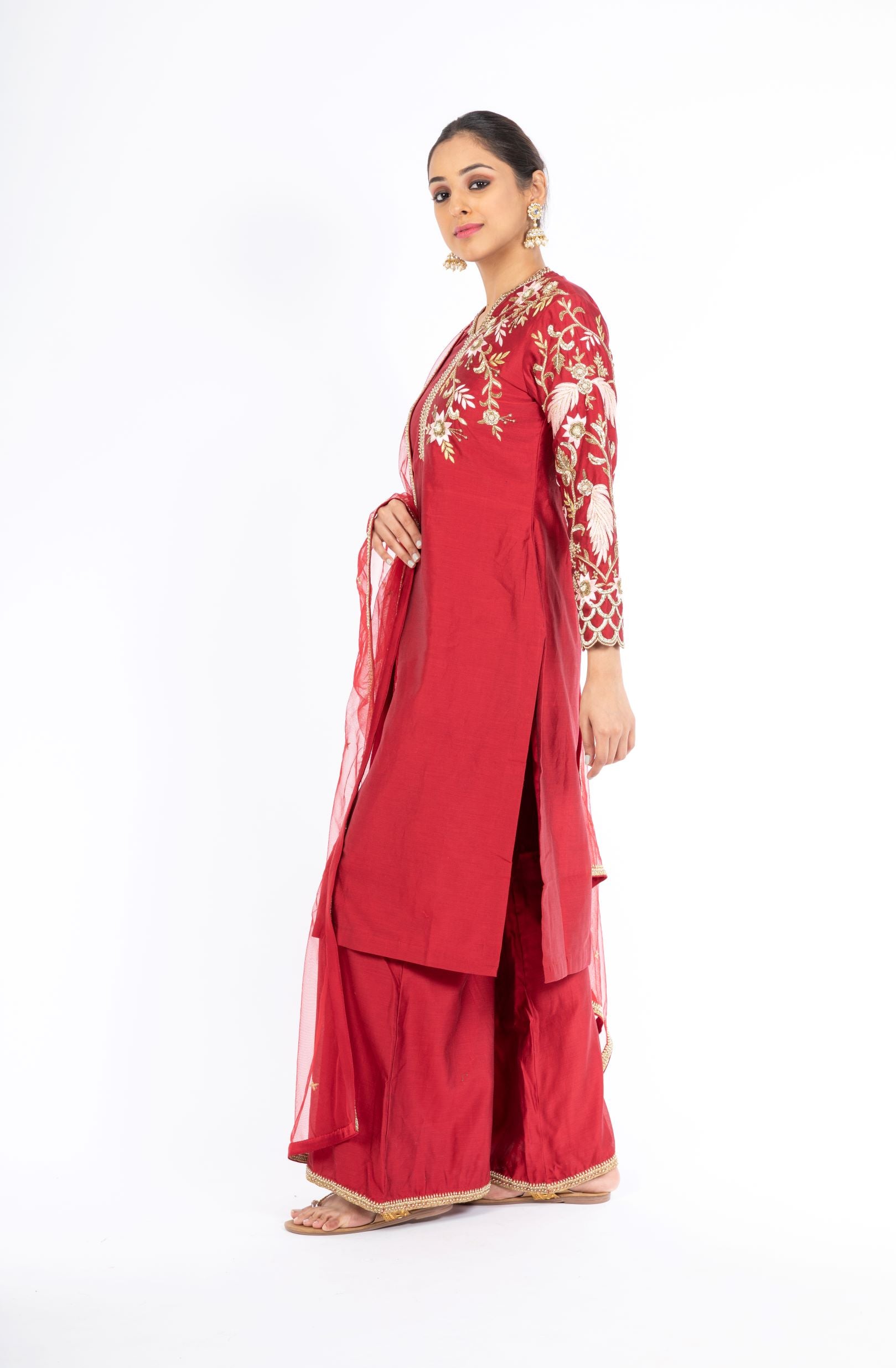 Alluring Deep Red Chanderi Silk Salwar Kameez with Net Dupatta