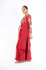 Alluring Deep Red Chanderi Silk Salwar Kameez with Net Dupatta