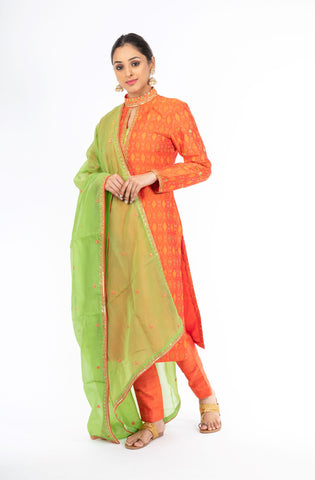 Alluring Mandarin Orange Raw Silk Ikkat Salwar Kameez