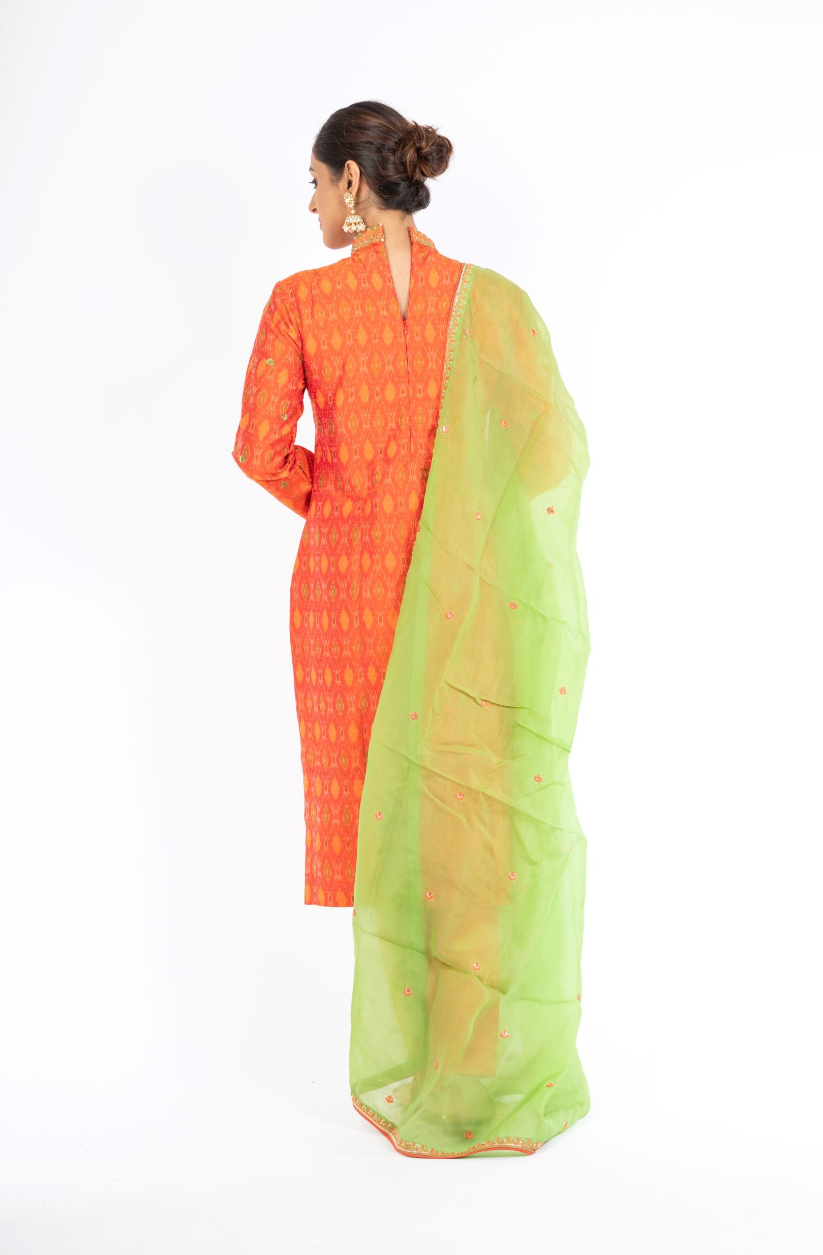 Alluring Mandarin Orange Raw Silk Ikkat Salwar Kameez