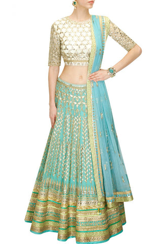 Aqua color Bridal Lehenga with white Choli