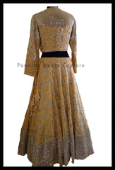 An Elegant Gold Beige Party Wear Lehenga Paired with a Silk Georgette Dupatta From Panache Haute Couture