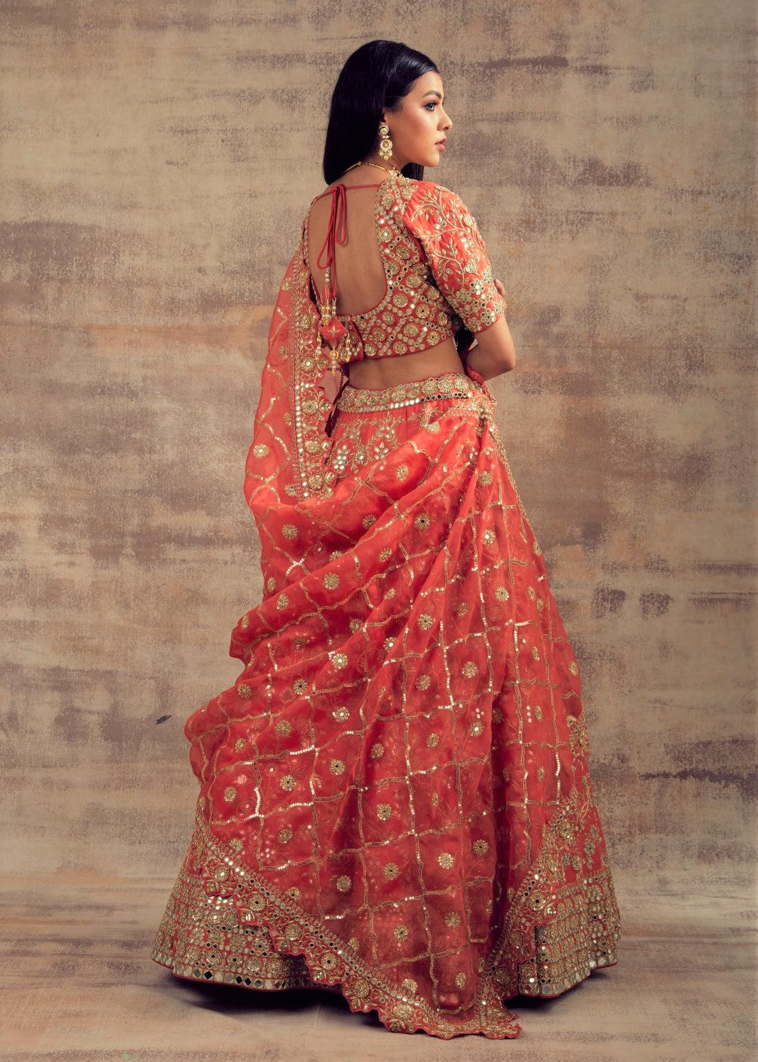 Coral Color Raw Silk Lehenga with Mirror and Gotta Embroidery