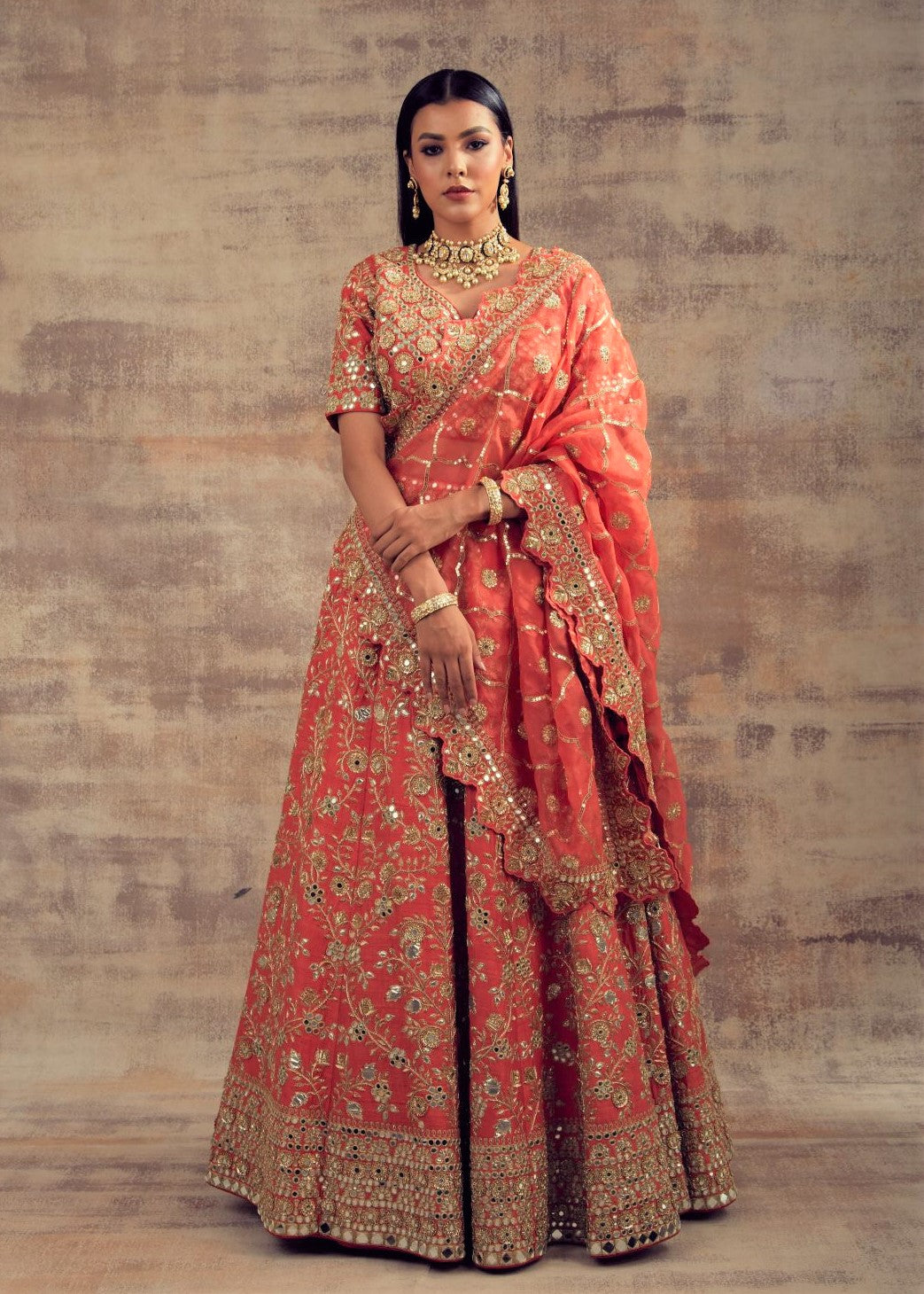 Coral Color Raw Silk Lehenga with Mirror and Gotta Embroidery