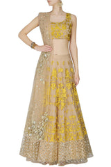 Peach lehenga choli with yellow embroidery