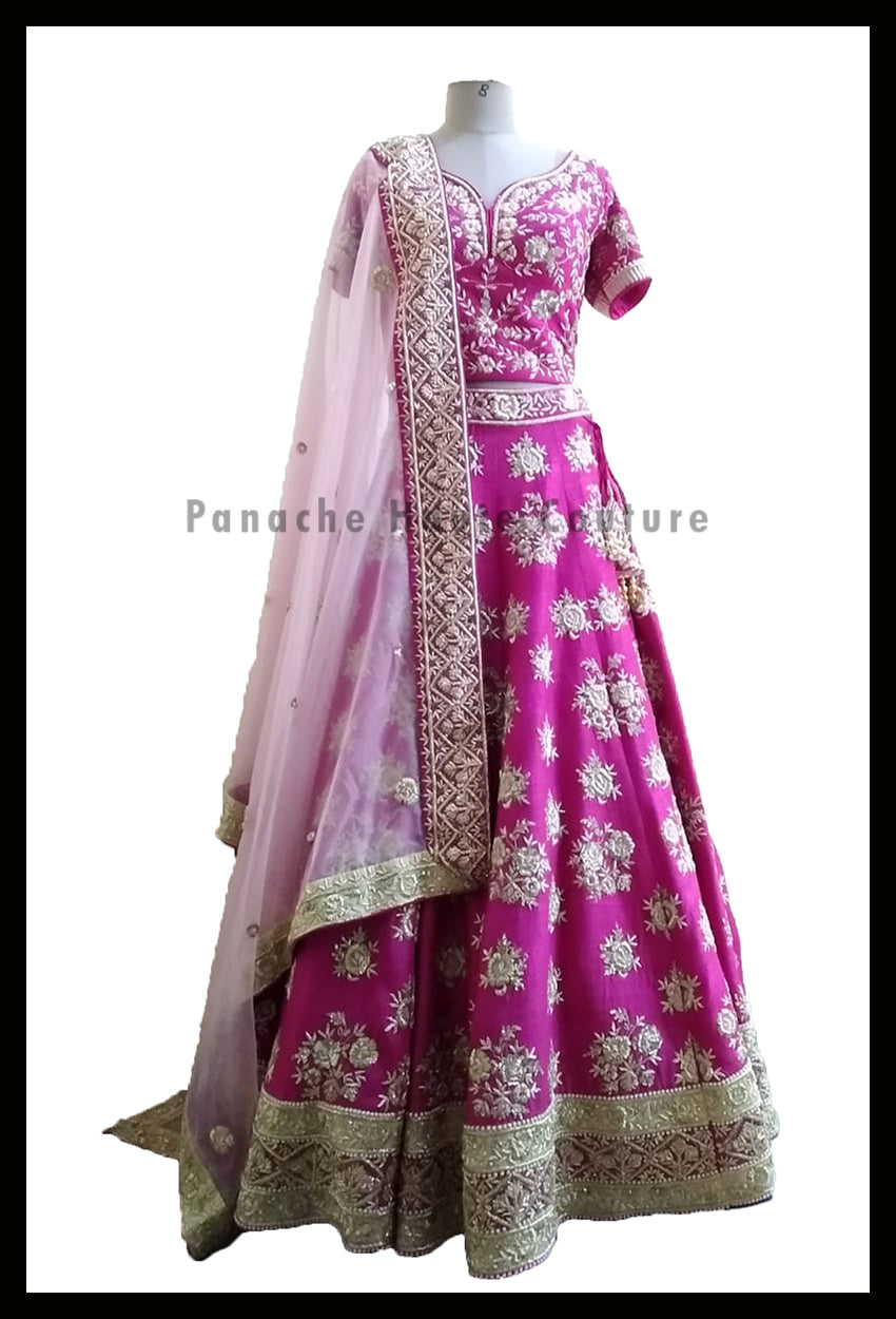 Pleasant Pink Partywear Raw Silk Lehenga Choli