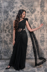 Complete Your Wardrobe With This Black Colored Net Saree