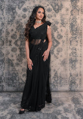 Complete Your Wardrobe With This Black Colored Net Saree