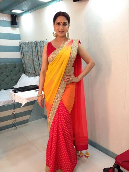 Madhuri Dixit in  Yellow red  saree