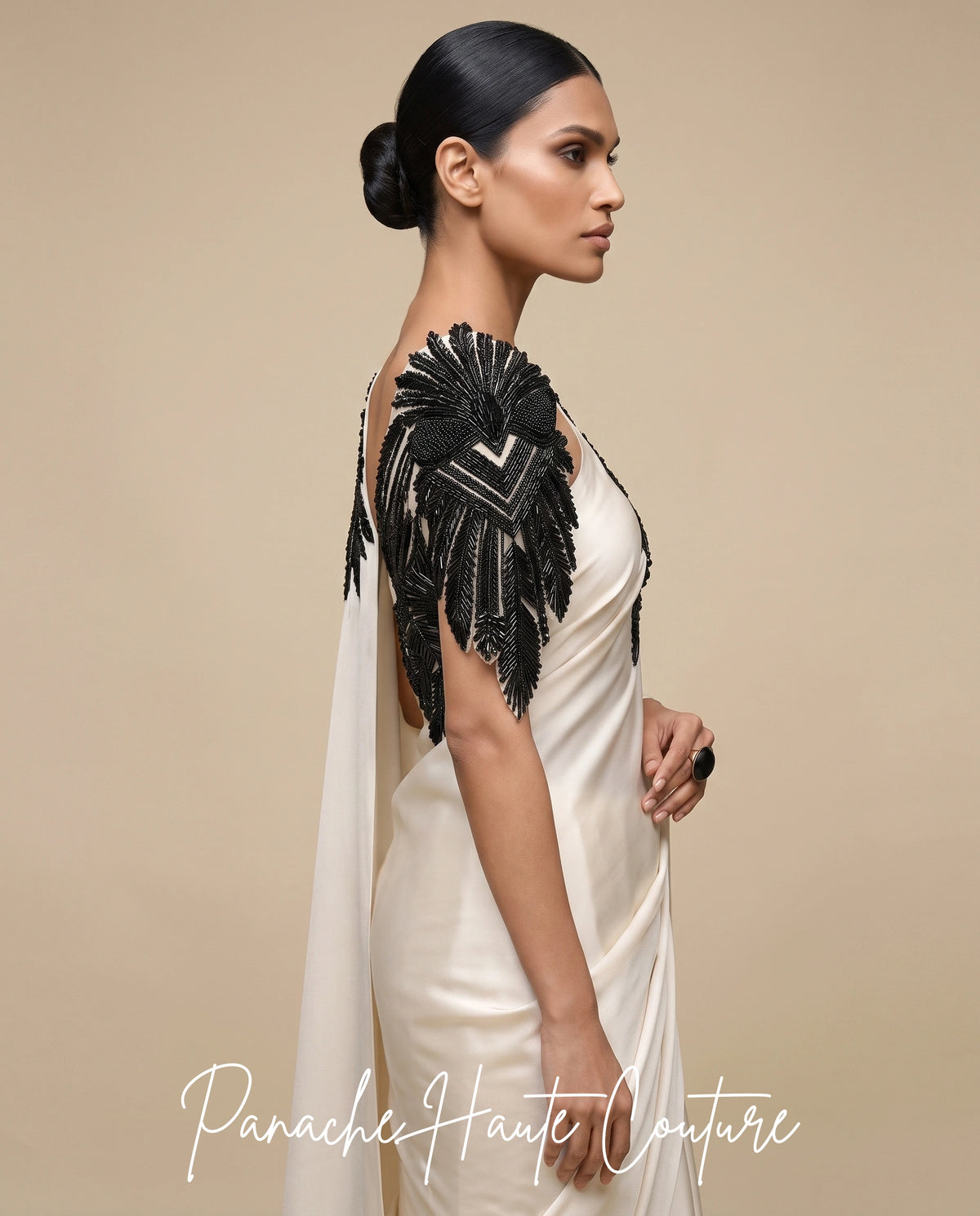 The Ivory Noir Statement Satin Silk Saree styled with jewellery