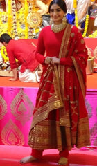 Sabyasachi-Inspired Red Matka Silk Anarkali Suit with Sequin &amp; Dori Work