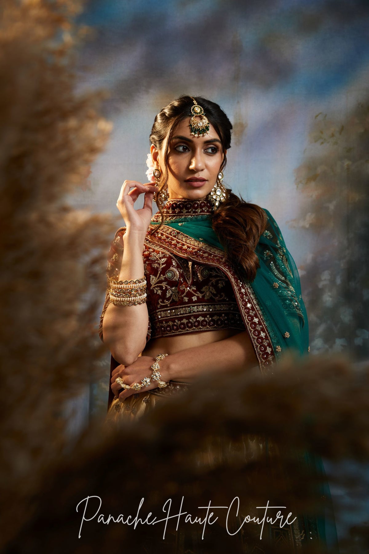 Zainab – Green & Gold Bridal Lehenga | Couture Bridal Wear styled with jewellery
