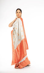 Adorning Grey Handloom Banarasi Silk Saree with Red Color Pallu