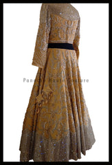 An Elegant Gold Beige Party Wear Lehenga Paired with a Silk Georgette Dupatta From Panache Haute Couture
