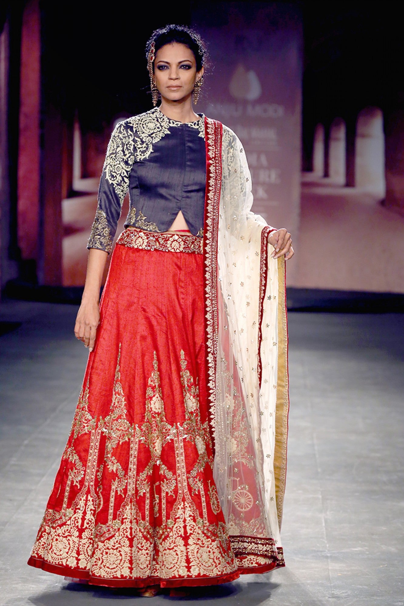 Indigo jacket-blouse with red embroidered lehenga