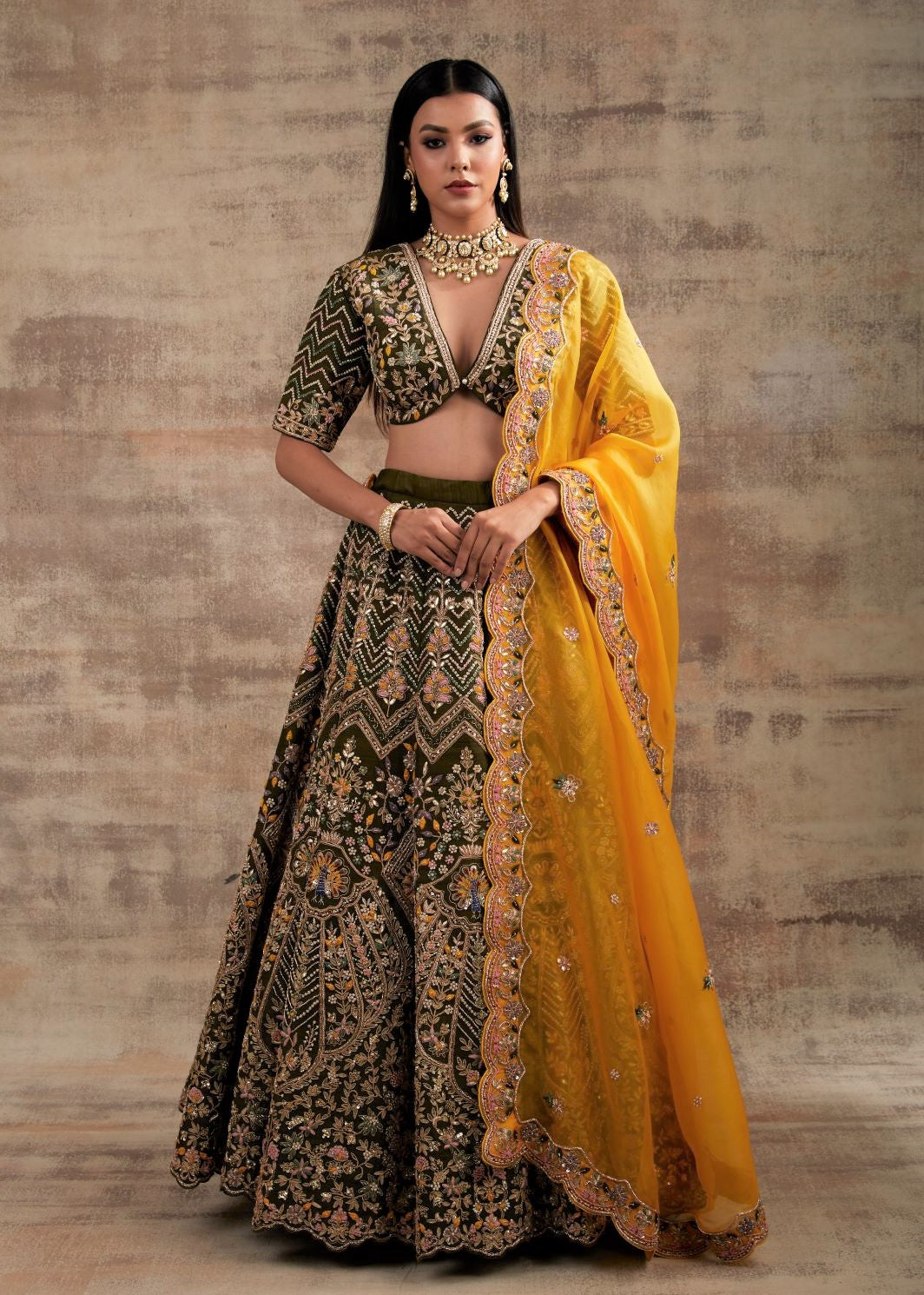 Bhumi Pednekar exudes regal vibes in a stunning olive green and golden  lehenga | Times of India