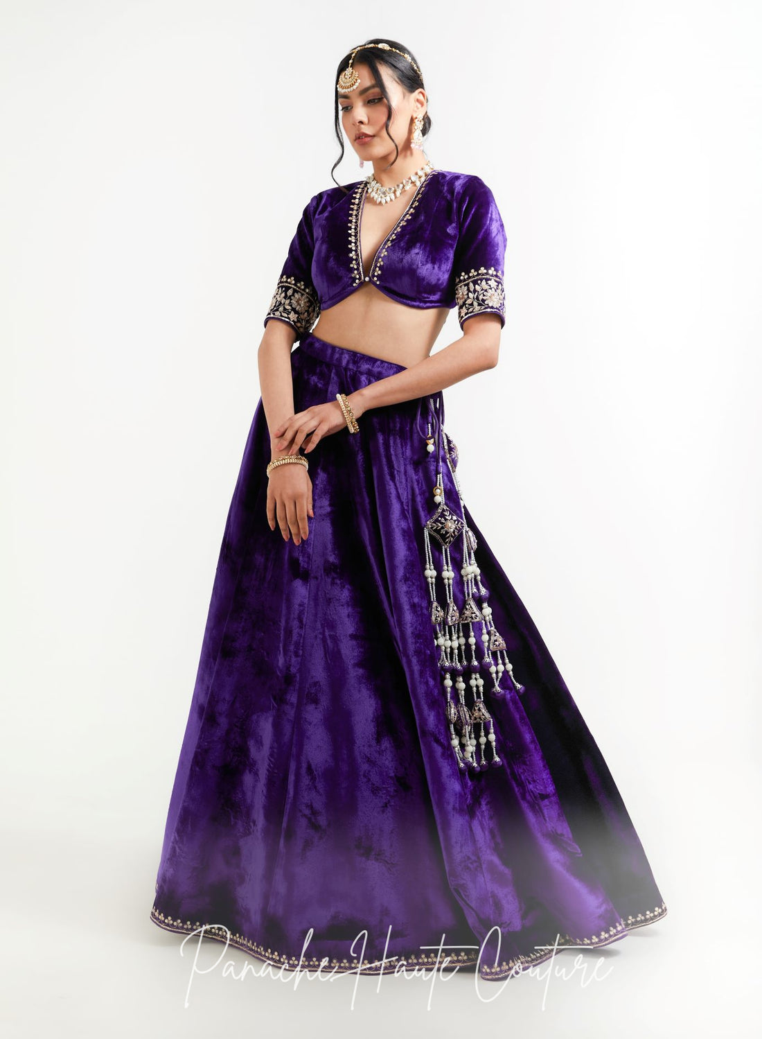 Bride wearing violet silk velvet lehenga with hand embroidery, Niya design, Sensual Shadows Collection by Panache Haute Couture