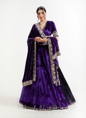 Detail of violet silk velvet fabric and embroidered embellishment on Niya bridal lehenga