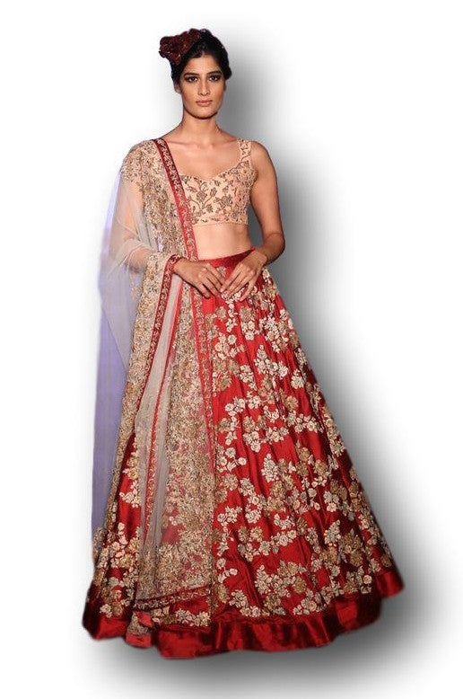 Photo of Red bridal lehenga with peach sleeves