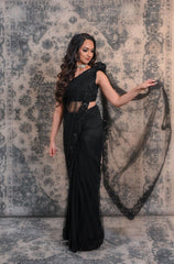 Complete Your Wardrobe With This Black Colored Net Saree