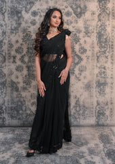 Complete Your Wardrobe With This Black Colored Net Saree